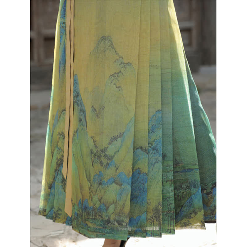 Hemd mit Vintage-Schnalle und Faltenrock mit Berg-Print