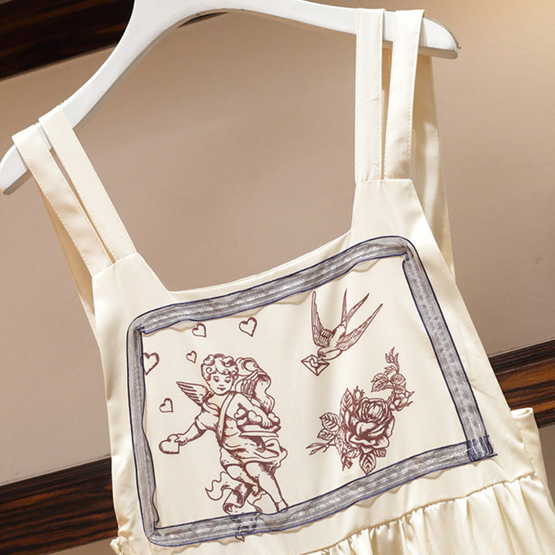 Ensemble sweat-shirt fleuri et robe-salopette