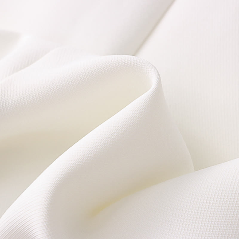 Faltenrock in reiner Farbe mit Cartoon-Kitty-Print