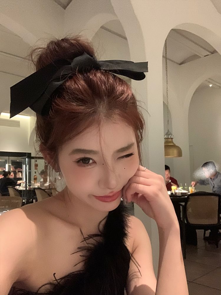 Pince à cheveux en tissu avec nœud