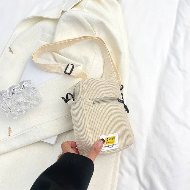 Sac bandoulière à appliques