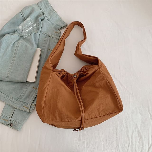 Sac bandoulière uni avec cordon de serrage