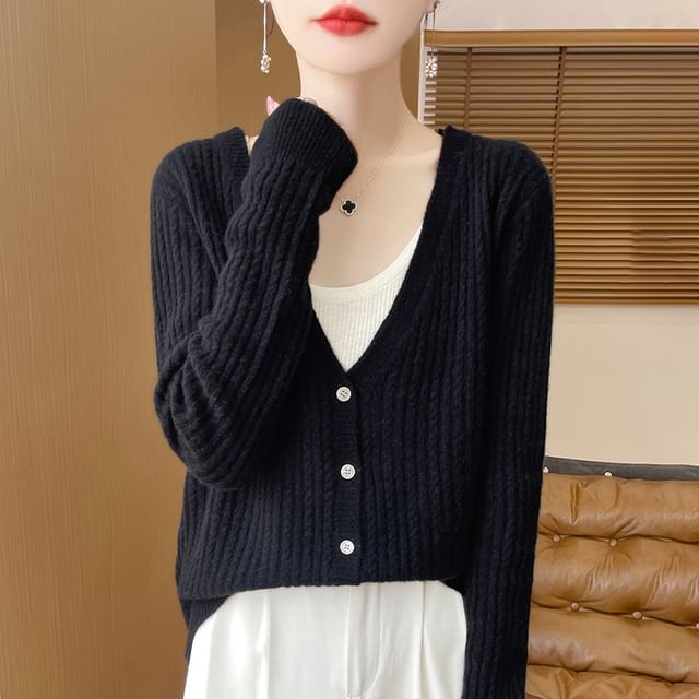 Cardigan en maille torsadée à col en V