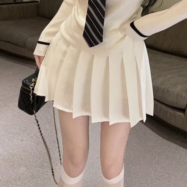Collared Long Sleeve Sweater with Tie Detail and Pleated Mini Skirt