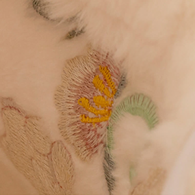 Bottes en peluche avec broderies vintage en forme de lapin