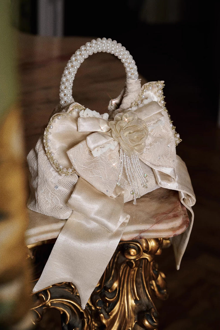 Gilded Pearl Bow Satin Handbag in Champagne