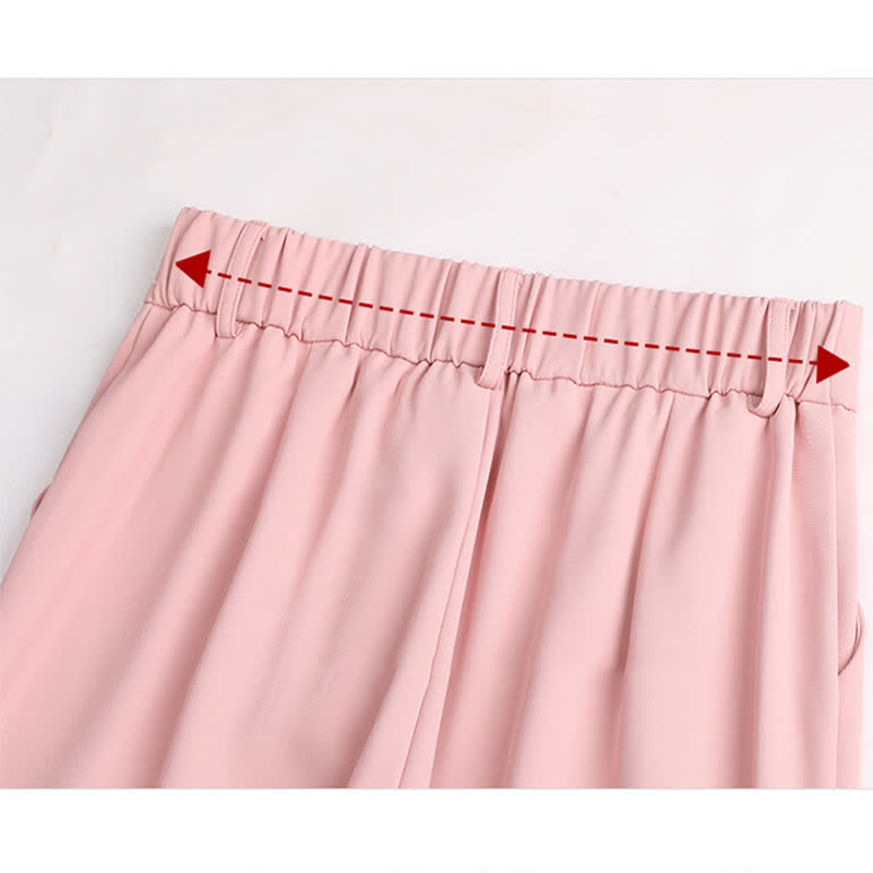 Chemise à revers rose et pantalon de costume décontracté