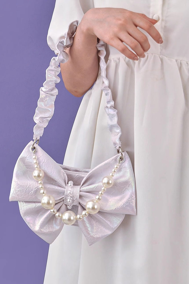 Sac à bandoulière avec chaîne et nœud papillon en perles douces