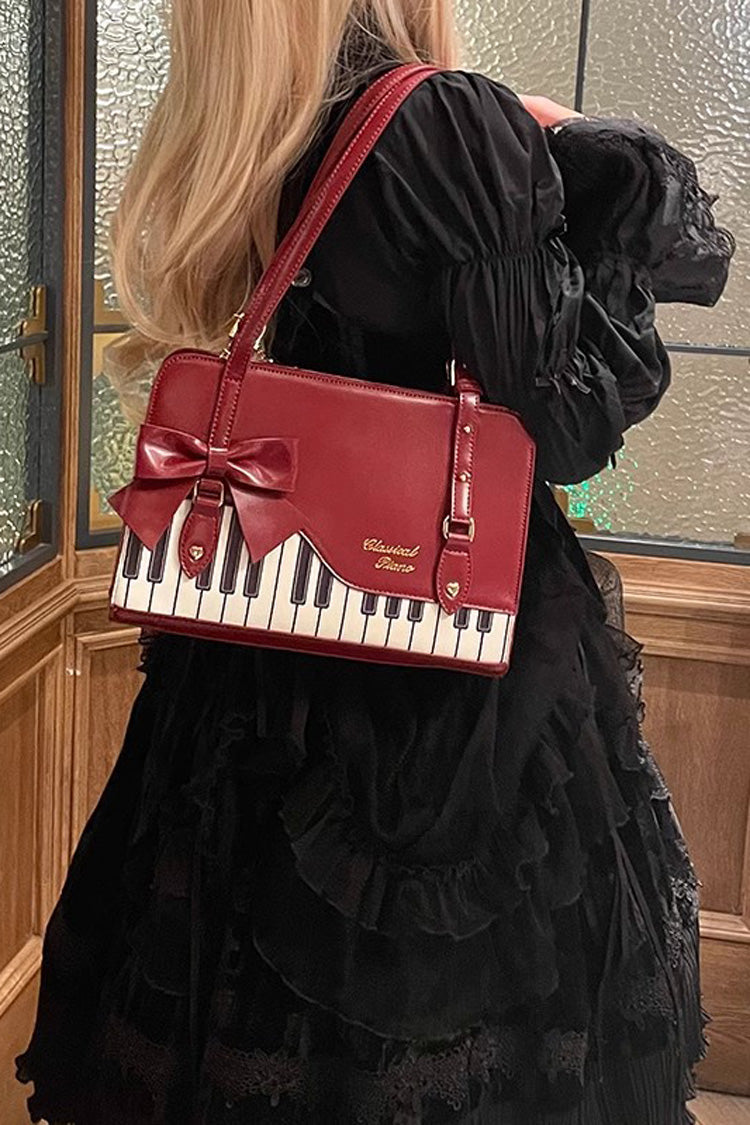 Sac à main avec nœud papillon et motif valse pour piano