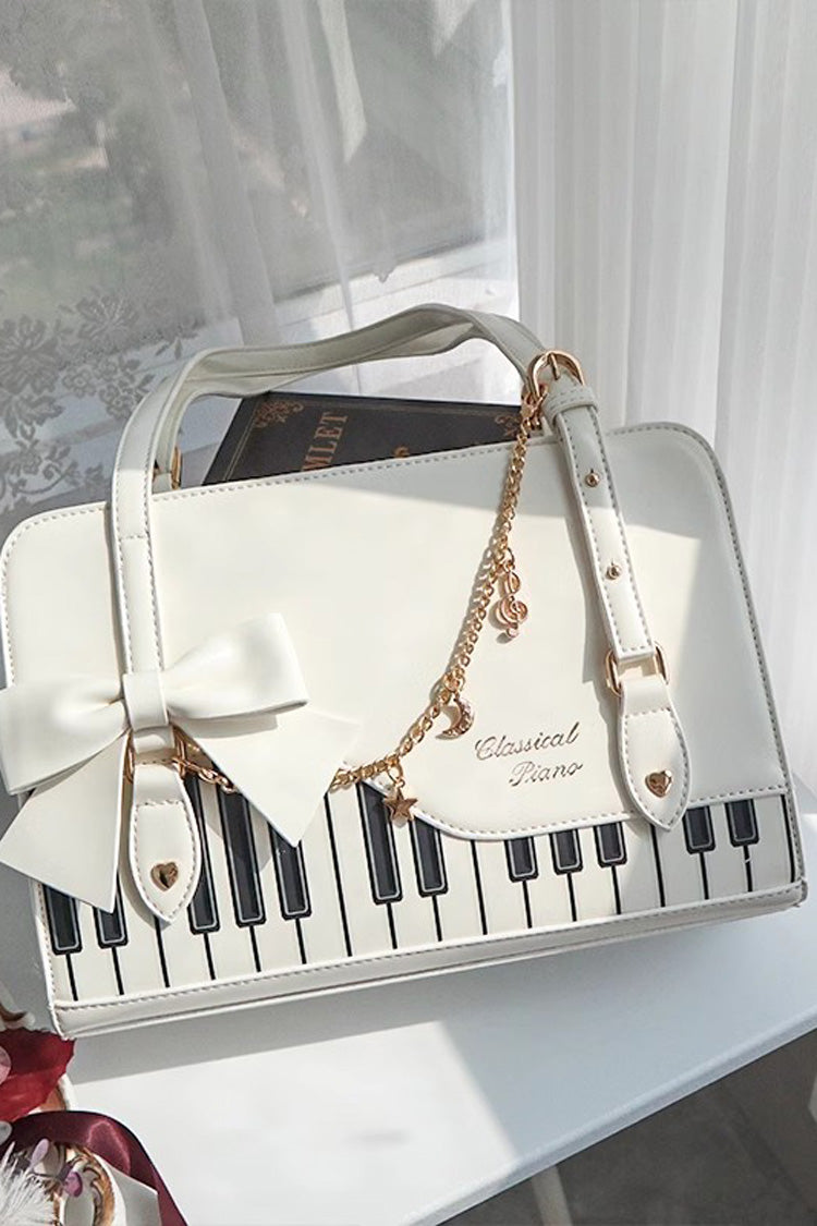 Sac à main avec nœud papillon et motif valse pour piano