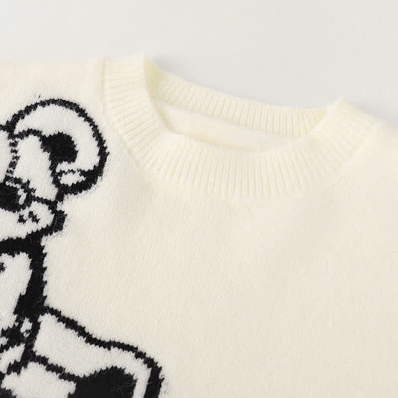 Zweiteiliges Set mit Pullover und Faltenrock mit Cartoon-Bär