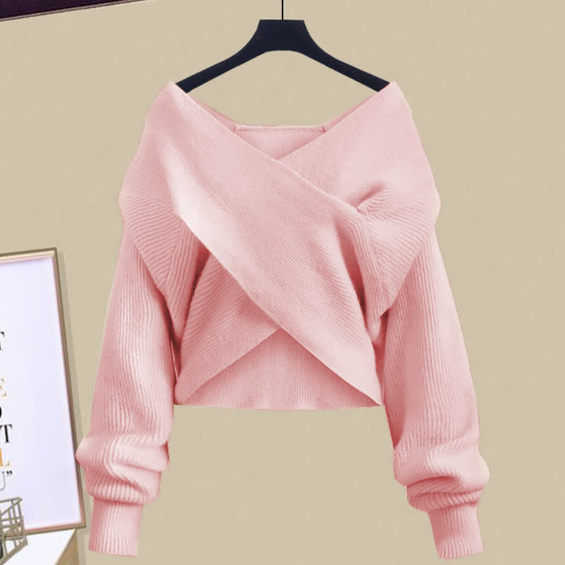 Ensemble pull en tricot rose croisé avec robe trapèze à volants