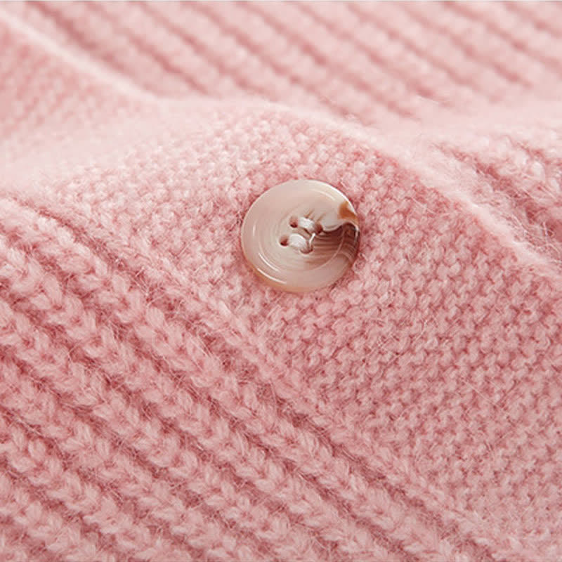 Rosa Strickpullover mit Schleife und Knoten, unregelmäßiges Hosenträgerkleid