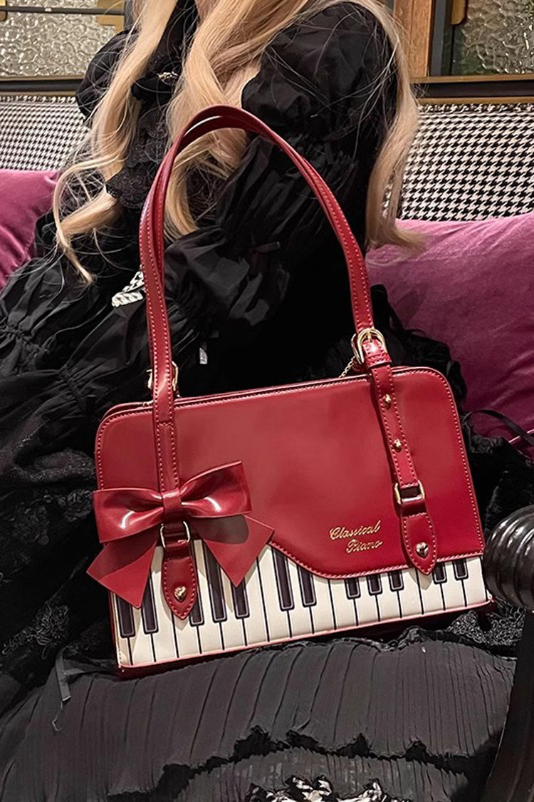 Sac à main avec nœud papillon et motif valse pour piano