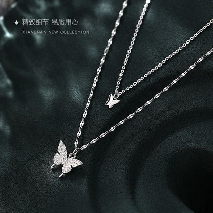 Mehrreihige Halskette aus Sterlingsilber mit Schmetterlingsanhänger