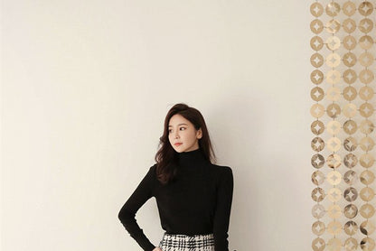 Karierte Schlaghose aus Wolle