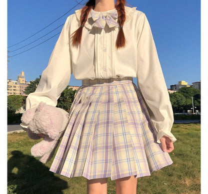 Chemisier à manches longues et bordure à volants