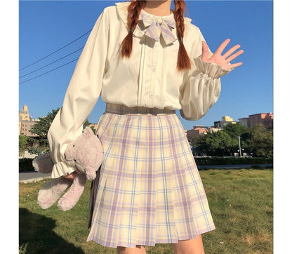 Chemisier à manches longues et bordure à volants