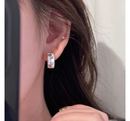 Creolen mit Blumenmotiv