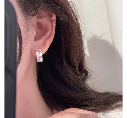 Creolen mit Blumenmotiv