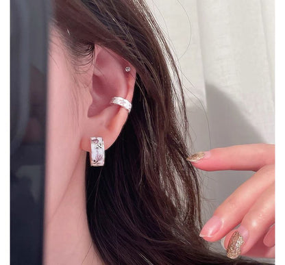 Creolen mit Blumenmotiv