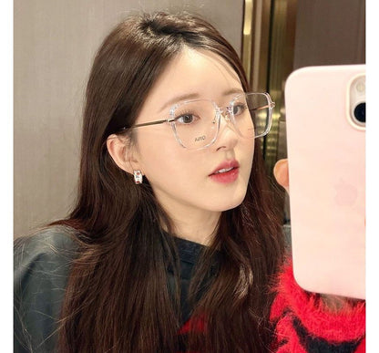 Creolen mit Blumenmotiv