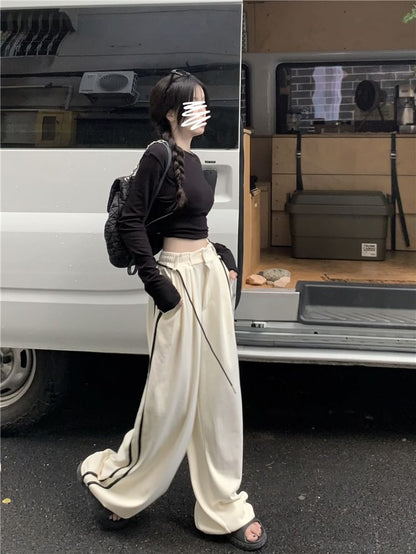 Long-Sleeve Round Neck Plain Cutout Crop Tee / Drawstring Waist Striped Wide Leg Sweatpants