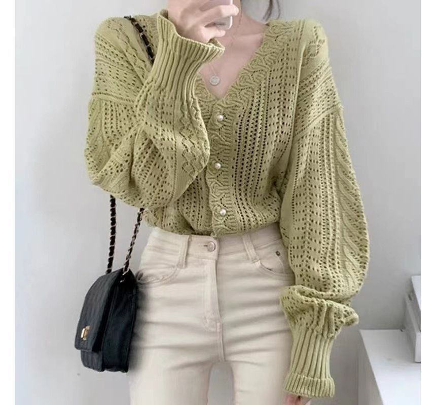 Cardigan en maille pointelle unie à col en V