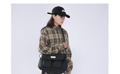 Sac bandoulière à rabat uni