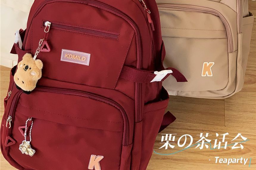 Rucksack/Taschenanhänger mit mehreren Taschen und Applikationen/Set