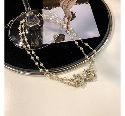 Pearl Layered Alloy Faux Choker Bow
