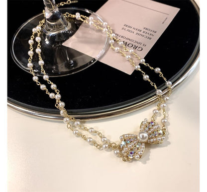 Pearl Layered Alloy Faux Choker Bow