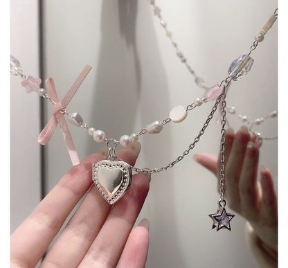 Halskette mit Kunstperlen und Herz-Anhänger