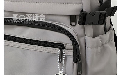 Sac à dos multi-poches avec appliques / Bijou de sac / Ensemble