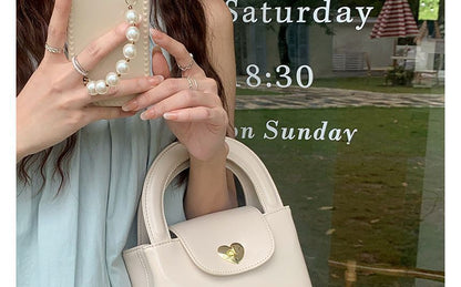 Heart Lock Faux Leather Handbag