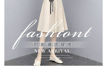 Set: Short-Sleeve Round Neck Plain T-Shirt + Elastic Waist Plain Midi A-Line Skirt