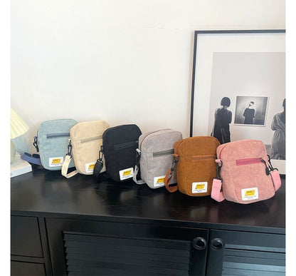 Sac bandoulière à appliques