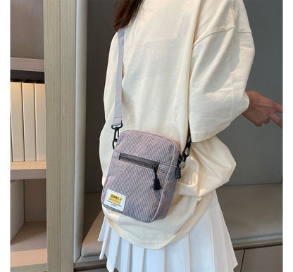 Sac bandoulière à appliques