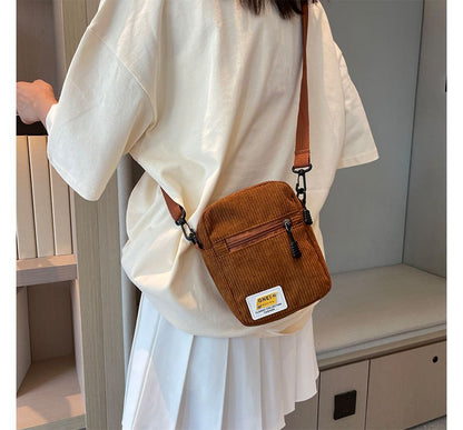 Sac bandoulière à appliques