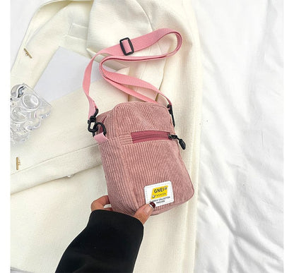 Sac bandoulière à appliques