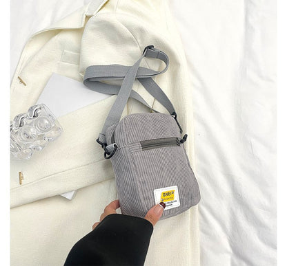 Sac bandoulière à appliques