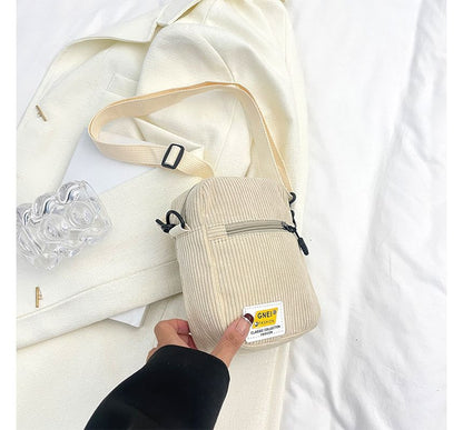 Sac bandoulière à appliques