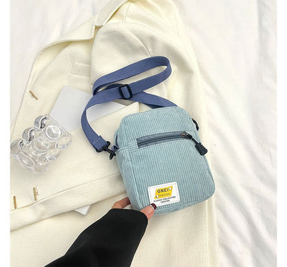 Sac bandoulière à appliques