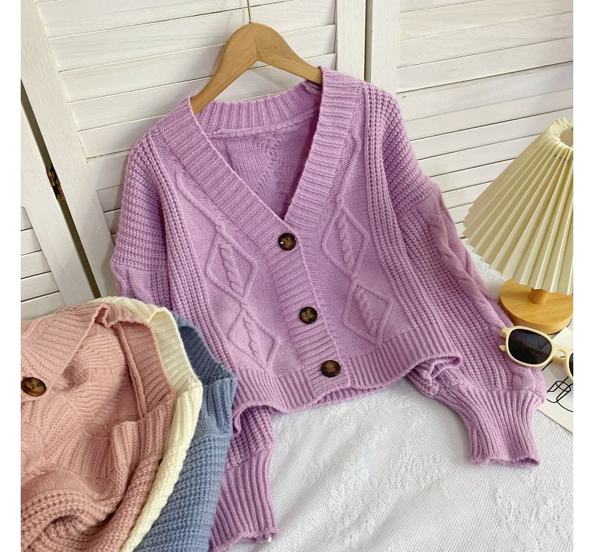 Cardigan uni en maille torsadée à col en V et boutons