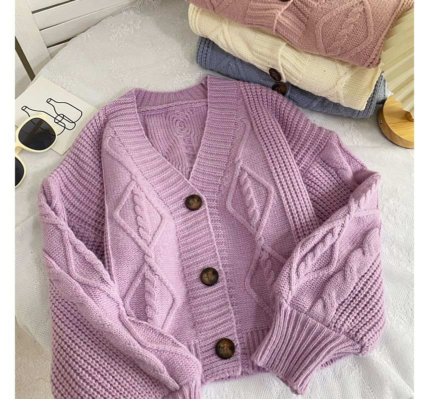 Cardigan uni en maille torsadée à col en V et boutons