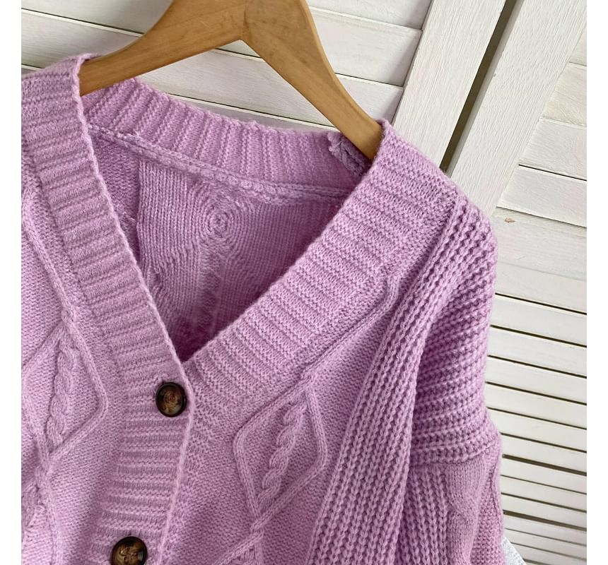 Cardigan uni en maille torsadée à col en V et boutons