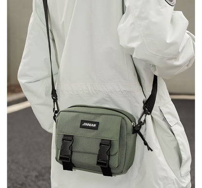 Sac bandoulière zippé avec lettrage