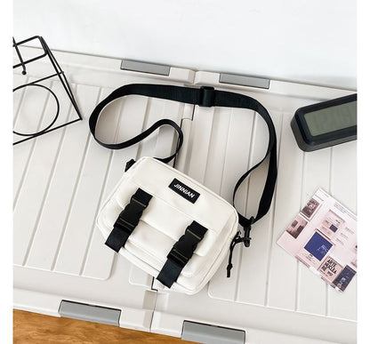 Sac bandoulière zippé avec lettrage