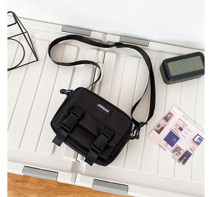 Sac bandoulière zippé avec lettrage