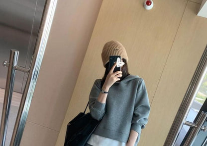 Long-Sleeve Hoodie Paired with High-Rise A-Line Skirt